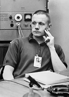 Neil Armstrong Listening to a Briefing