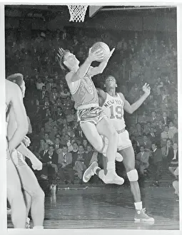 Neil Johnston Trying to Shoot for the Basket