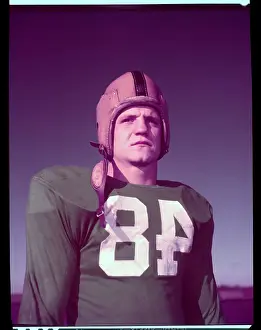 Neil Worden Pausing in Football Gear