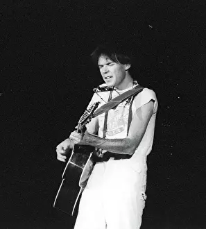 Prints of Musician Neil Young performing onstage in 1978 in Los Angeles. (Photo by Michael Ochs Archives/Getty Images) Echoes of a Legend: Celebrating the Enduring Spirit of a Music Icon: Neil Young Performing