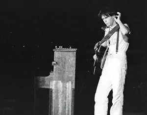 Prints of Musician Neil Young performing onstage in 1978 in Los Angeles. (Photo by Michael Ochs Archives/Getty Images) Echoes of a Legend: Celebrating the Enduring Spirit of a Music Icon: Neil Young Performing