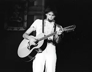 Prints of Musician Neil Young performing onstage in 1978 in Los Angeles. (Photo by Michael Ochs Archives/Getty Images) Echoes of a Legend: Celebrating the Enduring Spirit of a Music Icon: Neil Young Performing