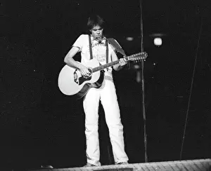 Prints of Musician Neil Young performing onstage in 1978 in Los Angeles. (Photo by Michael Ochs Archives/Getty Images) Echoes of a Legend: Celebrating the Enduring Spirit of a Music Icon: Neil Young Performing