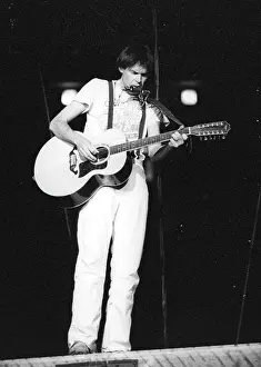 Prints of Musician Neil Young performing onstage in 1978 in Los Angeles. (Photo by Michael Ochs Archives/Getty Images) Echoes of a Legend: Celebrating the Enduring Spirit of a Music Icon: Neil Young Performing