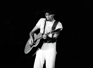 Prints of Musician Neil Young performing onstage in 1978 in Los Angeles. (Photo by Michael Ochs Archives/Getty Images) Echoes of a Legend: Celebrating the Enduring Spirit of a Music Icon: Neil Young Performing