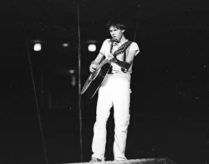 Prints of Musician Neil Young performing onstage in 1978 in Los Angeles. (Photo by Michael Ochs Archives/Getty Images) Echoes of a Legend: Celebrating the Enduring Spirit of a Music Icon: Neil Young Performing