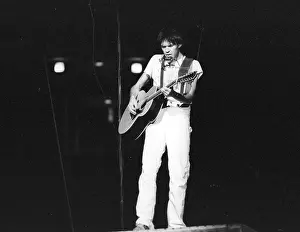 Prints of Musician Neil Young performing onstage in 1978 in Los Angeles. (Photo by Michael Ochs Archives/Getty Images) Echoes of a Legend: Celebrating the Enduring Spirit of a Music Icon: Neil Young Performing