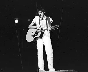 Prints of Musician Neil Young performing onstage in 1978 in Los Angeles. (Photo by Michael Ochs Archives/Getty Images) Echoes of a Legend: Celebrating the Enduring Spirit of a Music Icon: Neil Young Performing