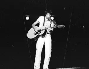 Prints of Musician Neil Young performing onstage in 1978 in Los Angeles. (Photo by Michael Ochs Archives/Getty Images) Echoes of a Legend: Celebrating the Enduring Spirit of a Music Icon: Neil Young Performing