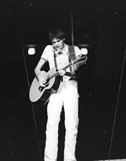 Prints of Musician Neil Young performing onstage in 1978 in Los Angeles. (Photo by Michael Ochs Archives/Getty Images) Echoes of a Legend: Celebrating the Enduring Spirit of a Music Icon: Neil Young Performing