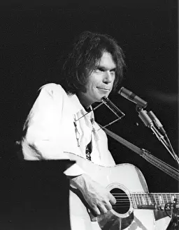 Prints of Musician Neil Young performs on stage onstage in circa 1984. California. (Photo by Michael Ochs Archives/Getty Images) Echoes of a Legend: Celebrating the Enduring Spirit of a Music Icon: Neil Young Performing