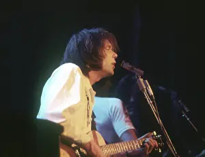 Prints of Musician Neil Young performs on stage onstage in circa 1984. California. (Photo by Michael Ochs Archives/Getty Images) Echoes of a Legend: Celebrating the Enduring Spirit of a Music Icon: Neil Young Performing