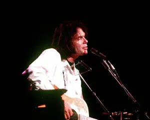 Prints of Musician Neil Young performs on stage onstage in circa 1984. California. (Photo by Michael Ochs Archives/Getty Images) Echoes of a Legend: Celebrating the Enduring Spirit of a Music Icon: Neil Young Performing