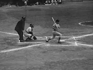 Nellie Fox Fouling a Ball Down the First Base Line