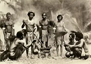 New Guinea Natives Posing at Cooking Scene