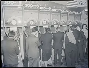 Nickel Prints: New York Crowd Using Slot-Machines