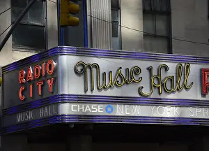 Prints of NEW YORK, NY - APRIL 26, 2015: The Radio City Music Hall is an entertainment venue in Rockefeller Center in Midtown Manhattan in New York, New York. (Photo by Robert Alexander/Getty Images) Where New York’s brightest moments take center stage: New York Scenics