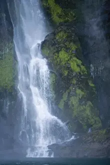 Paul Souders Photography Prints: New Zealand, South Island, waterfall flowing into Milford Sound, dawn