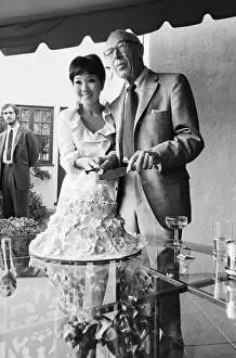 Writer Prints: Newlyweds Cutting Wedding Cake
