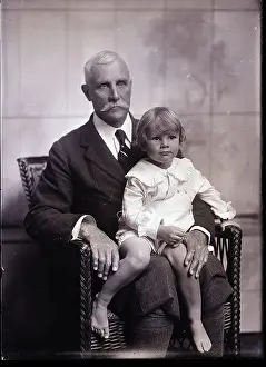 Gentleman Prints: Newport Society Man Poses with Young Son