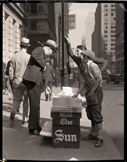 Newsboy Selling Newspapers on Street