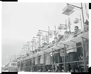 Newsmen Covering Olympics from Specially Constructed Stand