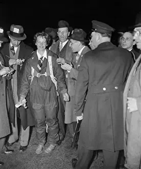 Newark Prints: Newsmen Surrounding Amelia Earhart After Flight