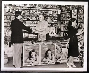 Camden Prints: Newsstand Operator Taking Money/Customer