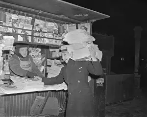 Relief Prints: Newsstand Vendor Shaking Hand of Man Delivering Papers