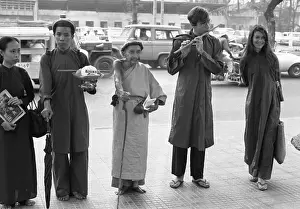 Nguyen Thanh Nam and John Steinbeck IV Plays Flute Outside U.S. Embassy