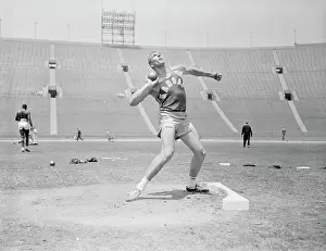 Sports Uniform Prints: Bill Nieder Holding a Shotput