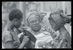 Lagos Prints: Nigerian Woman Placing Bets