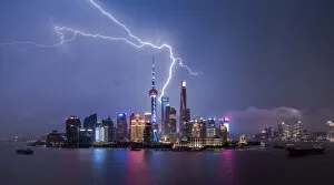 Lightning Storms Gallery: night view of Shanghai Lujiazui buildings with lightning