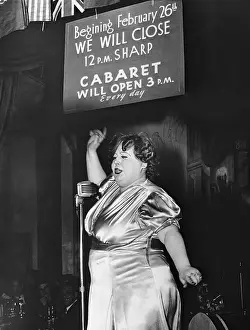 Nightclub Signer Pointing at Sign