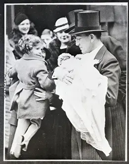Christening Prints: Noel Coward Holding Baby