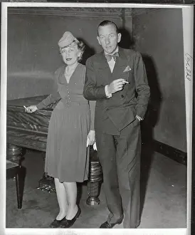 Noel Coward with Neysa McMein Attending Theater