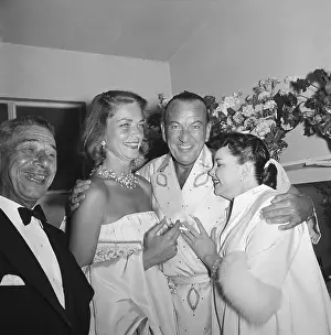 Noel Coward Posing with Judy Garland and Lauren Bacall