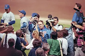Pitching Prints: Nolan Ryan Tips Cap Surrounded By Press