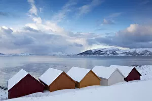 Evening Atmosphere Collection: Nordfjord with colorful wooden huts, Kvaloya, Norway, Europe