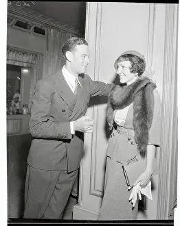 Norman Foster and Claudette Colbert