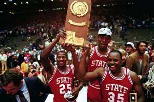 North Carolina State Players Posing with Their Winning Plaque
