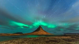 Images Dated 28th October 2013: Northern light at Kirkjufell with startrail and grass foreground