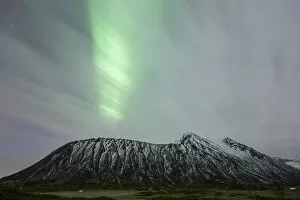 Northern lights, aurora borealis, during an overcast sky, Lofoten, Norway