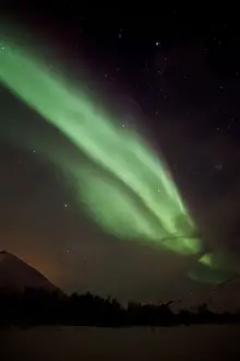Polar Lights Prints: Northern Lights over the Kattfjord pass in winter, Kvaloya, Tromso, Norway, Europe