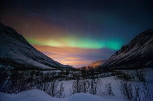 Images Dated 23rd February 2012: Northern lights in snow valley