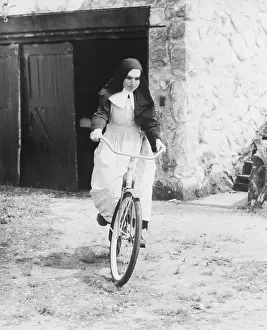 Bicycling Prints: Nun on a Bike