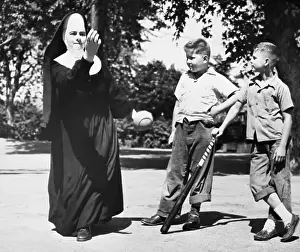 Nun Playing Baseball