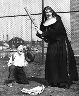 Nun Playing Baseball
