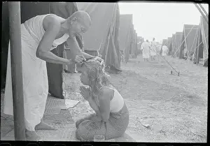 Nun Shaving Head of Woman