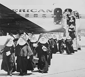Disembarking Prints: Nuns Disembarking Plane in Miami